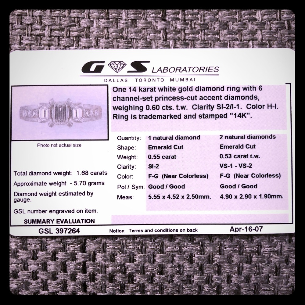 1.5 carat t.w. Emerald cut diamond ring